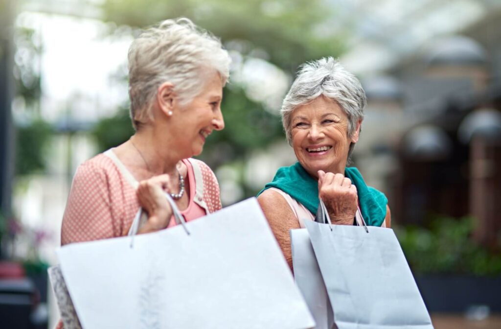 Two senior friends enjoying an outing of shopping together